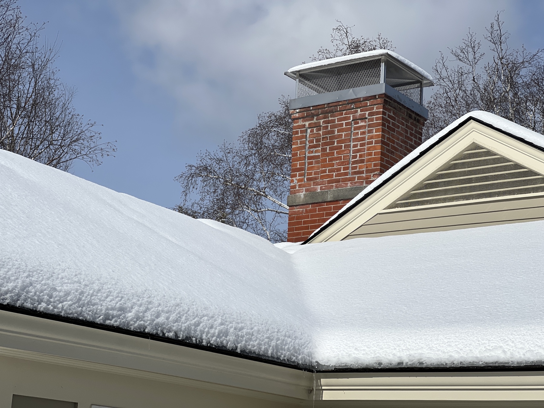 close-up of snow on the roof of a house
